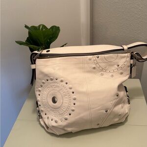 Cream genuine leather Coach purse with beautiful lime green interior. Never used